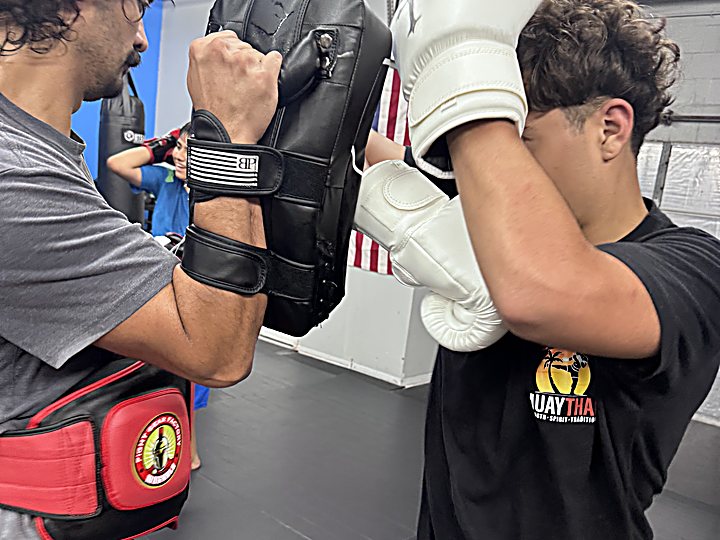 Pad work and defense at Laguna Muay Thai