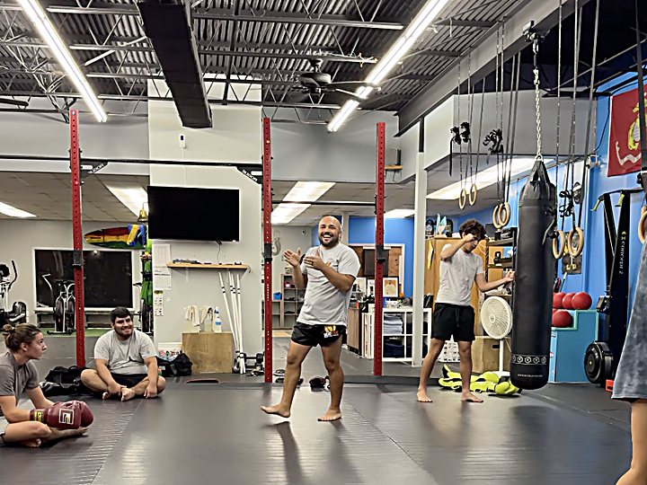 Kru Claudiu coaching the Laguna Muay Thai class